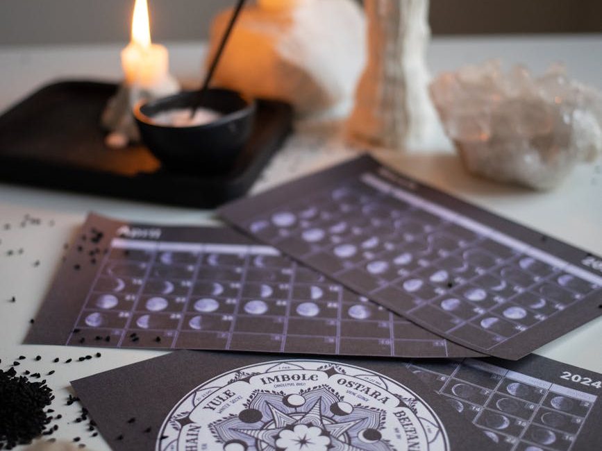 hand burning aromatherapy stick in bowl